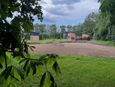 Blick von der Einfahrt auf den Stellplatz