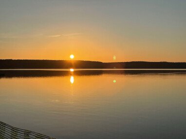 Sonnenuntergang am Wariner Badestrand